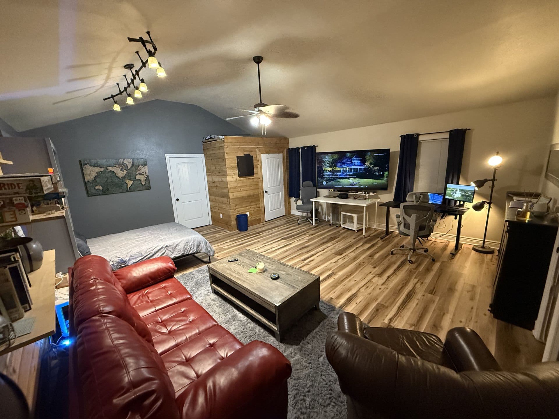 Church Street Studio interior - open living space with workspace, entertainment area, and cozy seating